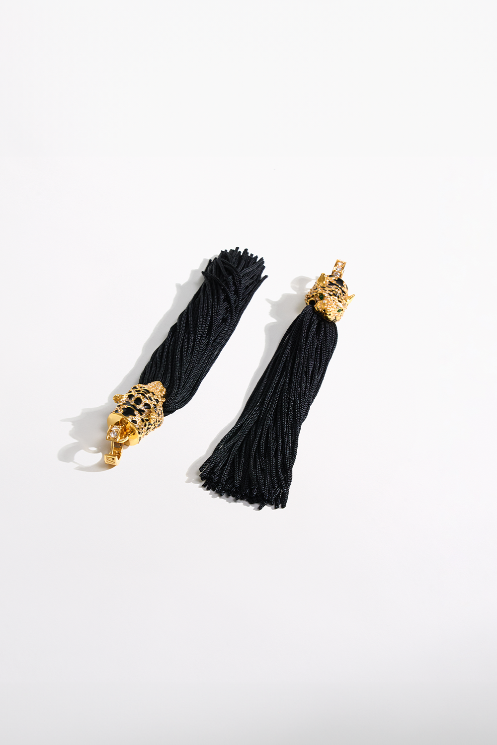 CAMILLA_00037690_FIERCE_FOLKLORE_BLACK_TASSEL_EARRINGS_GOLD_GHOST_1