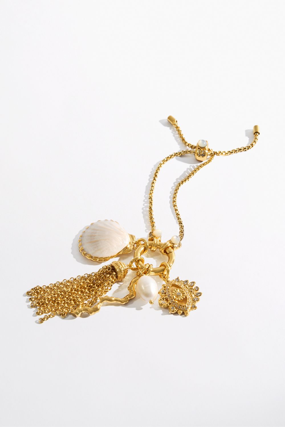CAMILLA_00041044_SHELL_ADJUSTABLE_CHARM_BRACELET_GOLD_GHOST_1